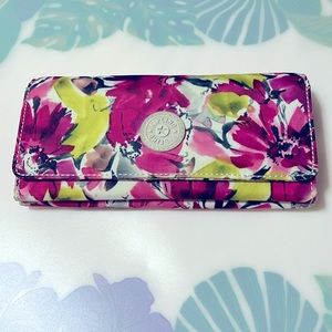 Kipling wallet, Teddy.  Used briefly; it’s in excellent condition!